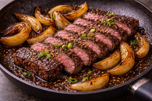 Black Pepper Seared Steak with Scorched Onions