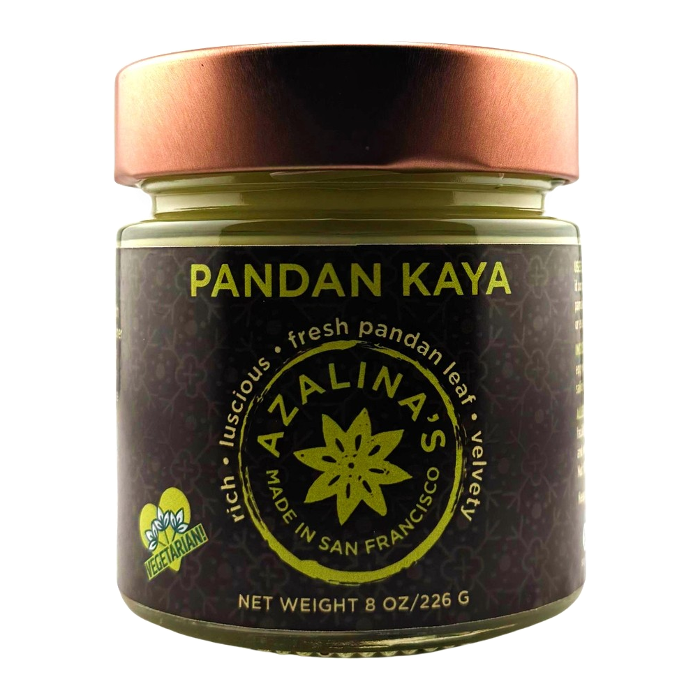 Jar of Pandan Kaya with a bronze lid on a white background