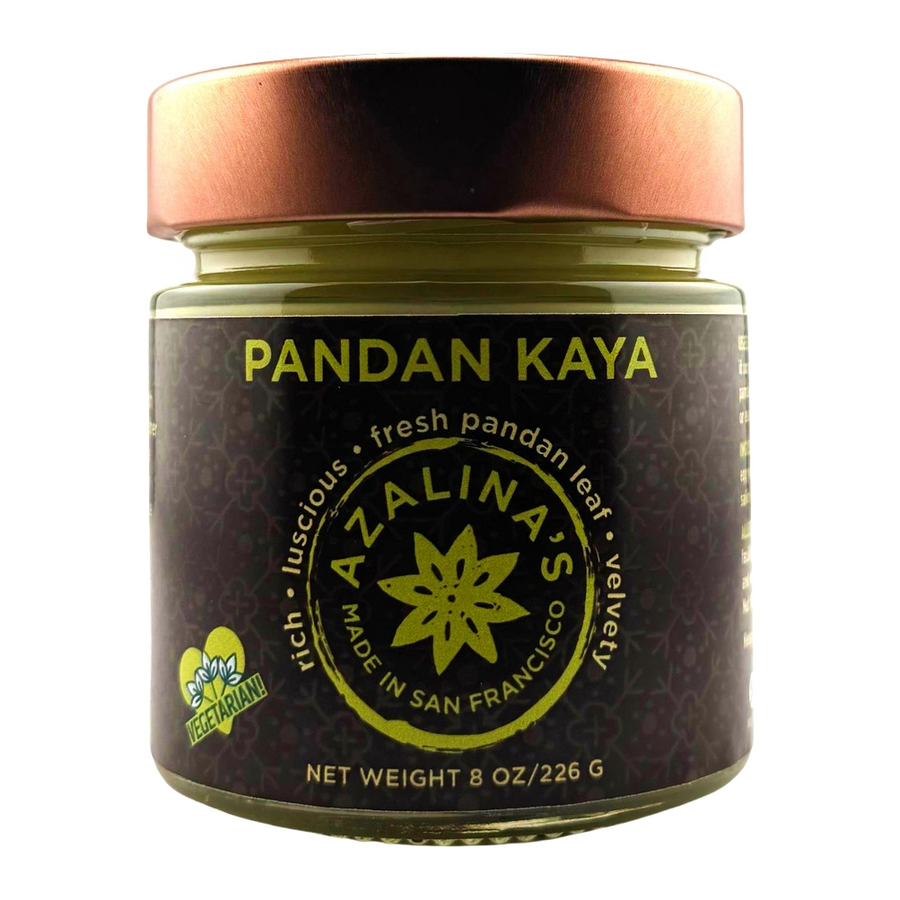 Jar of Pandan Kaya with a bronze lid on a white background