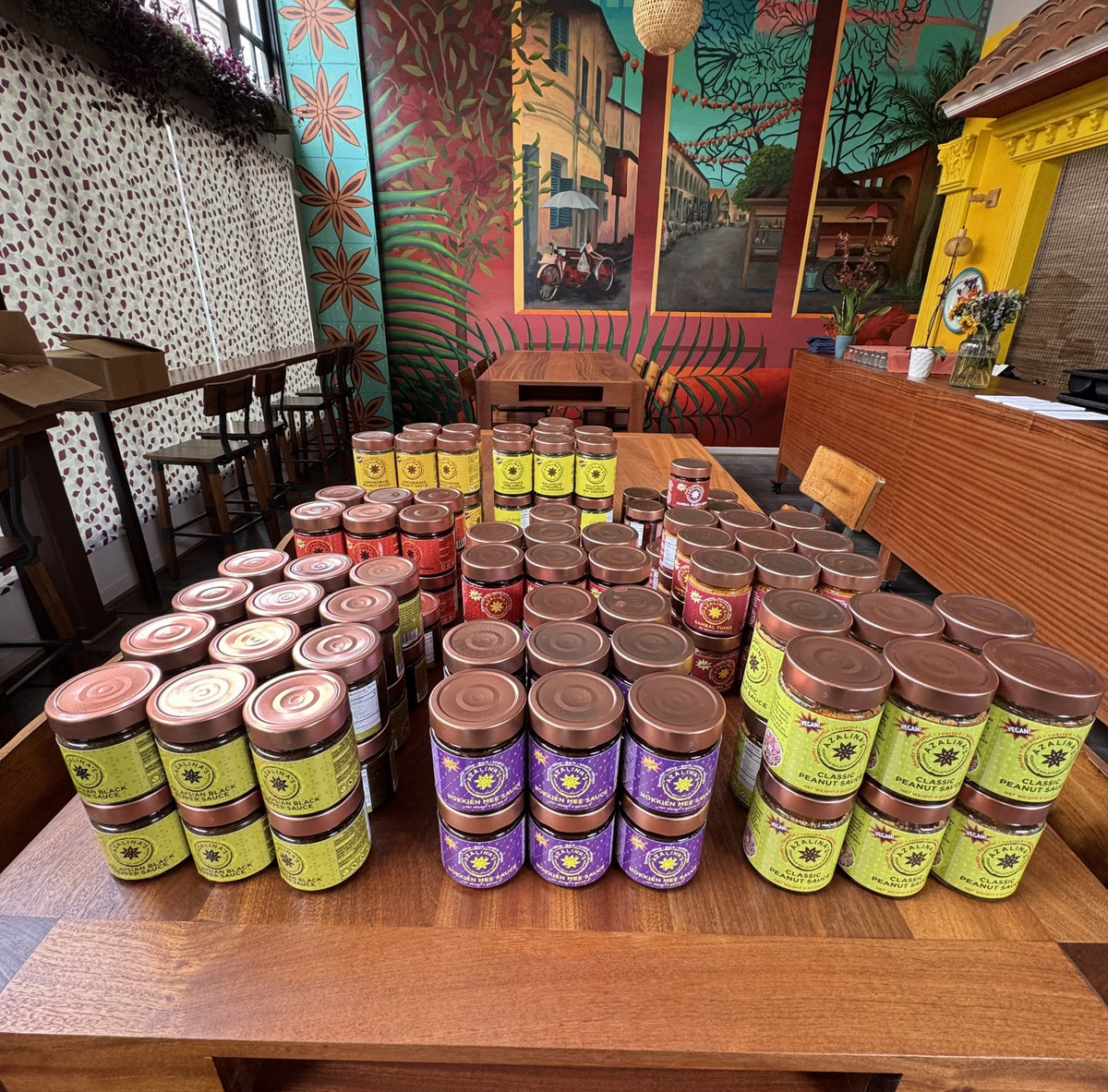 Small batch production of Azalina’s sauces, hand prepared and jarred